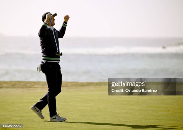 Justin Rose of England celebrates his victory on the 18th green during the continuation of the final round of the AT&T Pebble Beach Pro-Am at Pebble...