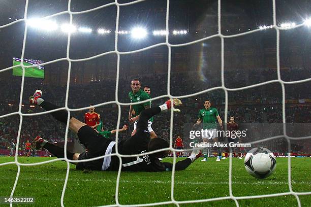 David Silva of Spain scores their second goal past Shay Given of Republic of Ireland during the UEFA EURO 2012 group C match between Spain and...