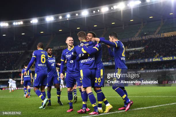 Cyril Ngonge of Verona celebrates scoring his team's first goal with his team mates during the Serie A match between Hellas Verona and SS Lazio at...