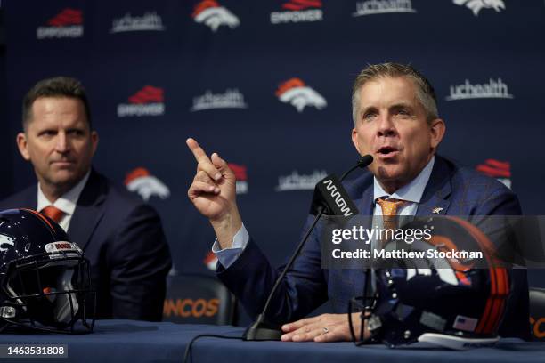 Denver Broncos General Manager George Paton listens as new Denver Broncos Head Coach Sean Payton fields questions from the media during a press...