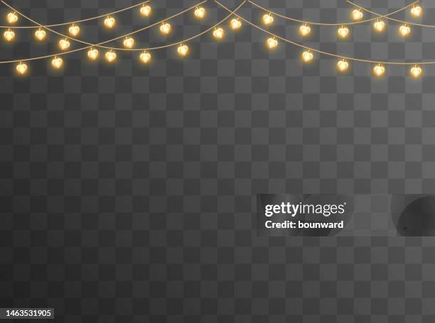 seamless heart lights on transparent background. - gold-glitter-transparent-background stock illustrations