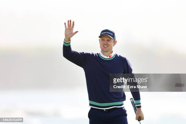 Justin Rose of England celebrates winning on the 18th green during the continuation of the final round of the AT&T Pebble Beach Pro-Am at Pebble...