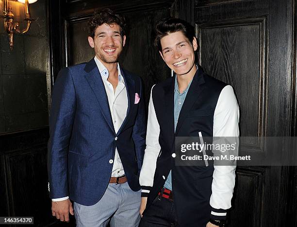 Models Max Rogers and Sam Way attend as Tommy Hilfiger hosts a cocktail party to celebrate the launch of London Collections: Men at The Scotch of St....