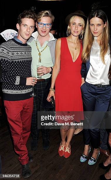 Luke Treadaway, Henry Conway, Ruta Gedmintas and Petra Nemcova attend as Tommy Hilfiger hosts a cocktail party to celebrate the launch of London...