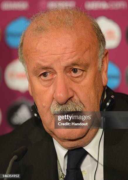 In this handout image provided by UEFA, Coach Vicente del Bosque of Spain talks to the media after the UEFA EURO 2012 Group C match between Spain and...