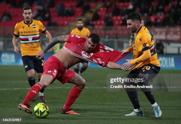 Nicola Murru of Sampdoria challenges Andrea Petagna of Monza during the Serie A match between AC Monza and UC Sampdoria at Stadio Brianteo on...