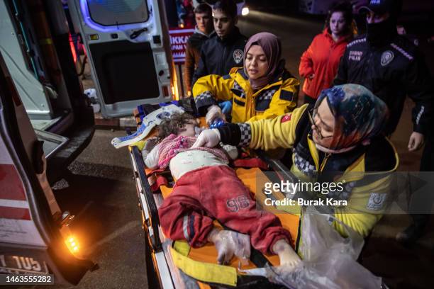 An earthquake survivor baby is assisted by the health workers to the hospital on February 06, 2023 in Iskenderun Turkey. A 7.8-magnitude earthquake...