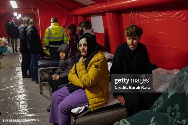 Wounded earthquake survivors wait to be treated at a field hospital on February 06, 2023 in Iskenderun Turkey. A 7.8-magnitude earthquake hit near...