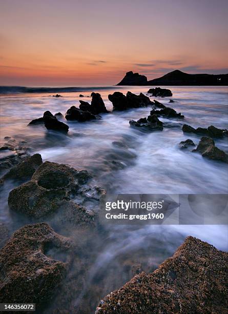 devil's teeth - rhossili bay stock pictures, royalty-free photos & images