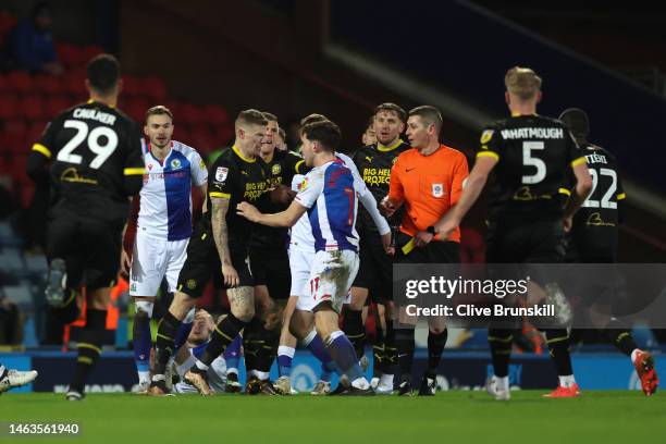 James McClean of Wigan receives a yellow card during the Sky Bet Championship between Blackburn Rovers and Wigan Athletic at Ewood Park on February...