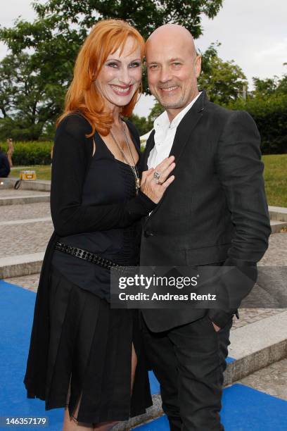 Andrea Sawatzki and partner Christian Berkel attend the producer party 2012 of the German producers alliance on June 14, 2012 in Berlin, Germany.
