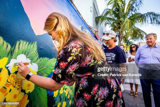 Princess Amalia of The Netherlands and King Willem-Alexander of The Netherlands visit the historical center of Philipsburg and the boulevard...