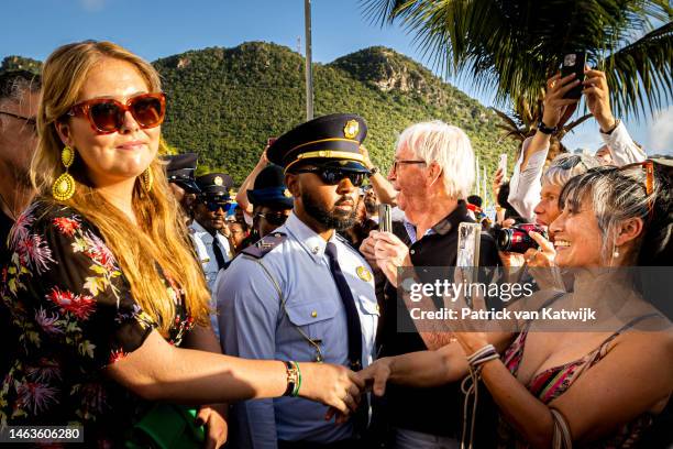 Princess Amalia of The Netherlands visit the historical center of Philipsburg and the boulevard Boardwalk at the Dutch Royal Family Tour Of The Dutch...