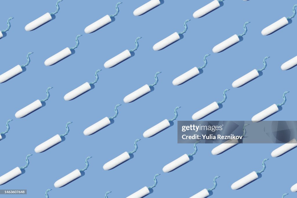 Repeated tampons on the blue background