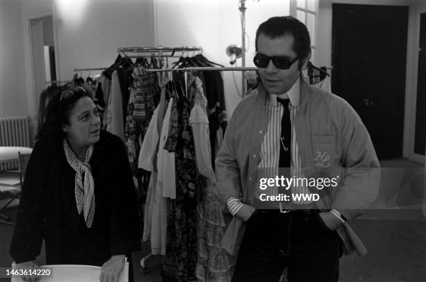 Designer Karl Lagerfeld, right hand-woman France de Dieuleveux and Chloe founder Gaby Aghion prep for a show in the Paris Atelier. Lagerfeld would be...