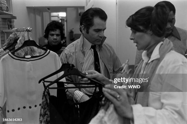 Designer Karl Lagerfeld, right hand-woman France de Dieuleveux and Chloe founder Gaby Aghion prep for a show in the Paris Atelier. Lagerfeld would be...