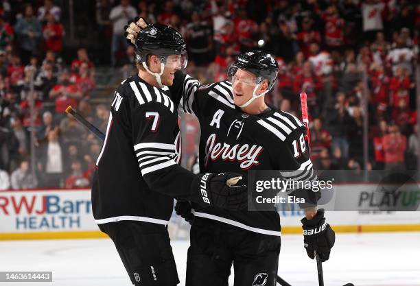 Ondrej Palat of the New Jersey Devils is congratulated by teammate Dougie Hamilton after Palat scored in the second period against the Vancouver...