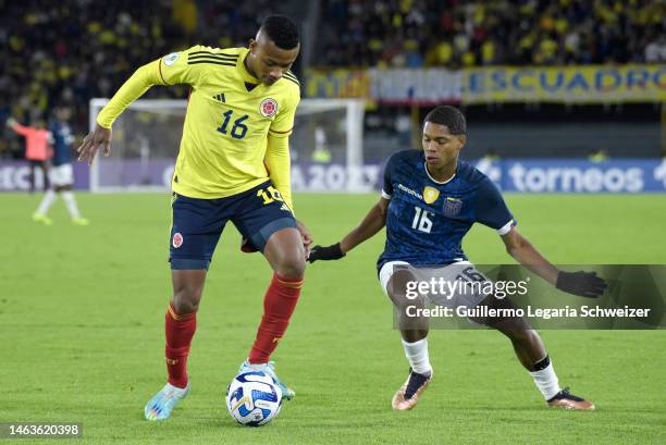 Oscar Cortes of Colombia fights for the ball with Jose Klinger of Ecuador during a South American U20 Championship match between Colombia and Ecuador...