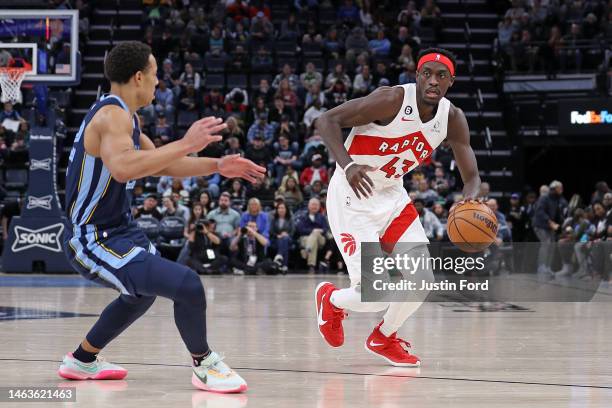 Pascal Siakam of the Toronto Raptors handles the ball against Desmond Bane of the Memphis Grizzlies during the game at FedExForum on February 05,...