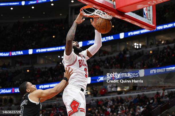 Andre Drummond of the Chicago Bulls dunks in the second half against the San Antonio Spurs at United Center on February 6, 2023 in Chicago, Illinois....