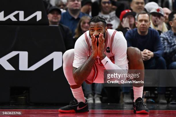 Andre Drummond of the Chicago Bulls reacts in the second half after being called for a foul against the San Antonio Spurs at United Center on...