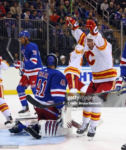 Chris Kreider of the New York Rangers celebrates a third period goal by Michael Stone against Jaroslav Halak of the New York Rangers at Madison...