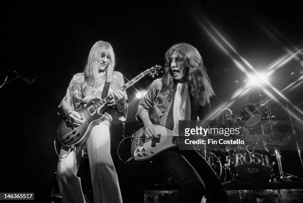 1st DECEMBER: Alex Lifeson and Geddy Lee from Canadian group Rush perform live on stage in Springfield, Massachusetts 9th December 1976 during their...