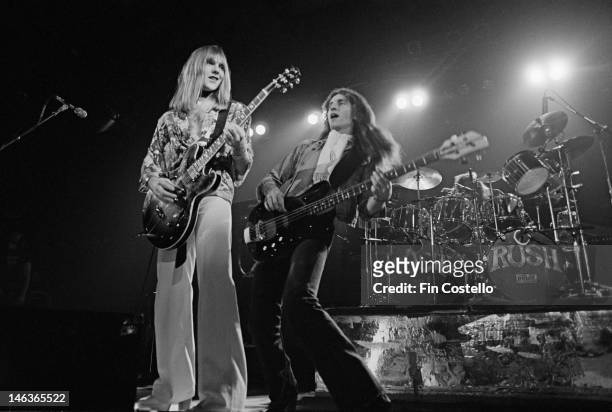 1st DECEMBER: Alex Lifeson and Geddy Lee from Canadian group Rush perform live on stage in Springfield, Massachusetts, 9th December 1976 during their...