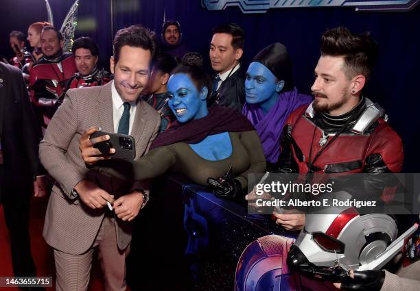 Paul Rudd poses with fans for a selfie during the Ant-Man and The Wasp Quantumania world premiere at Regency Village Theatre in Westwood, California...