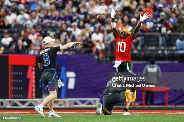 Wide receiver Tyreek Hill of the Miami Dolphins jumps and blocks a pass from NFC quarterback Kirk Cousins of the Minnesota Vikings during an NFL Pro...