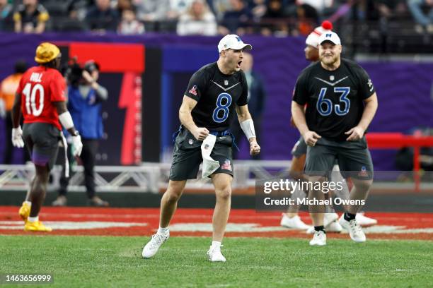 Quarterback Kirk Cousins of the Minnesota Vikings reacts after passing for a touchdown during an NFL Pro Bowl football game at Allegiant Stadium on...