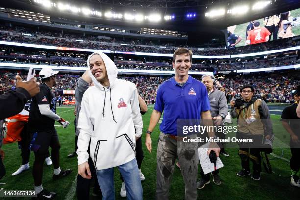 Head coach Eli Manning celebrates with NFC captain Pete Davidson after defeating the AFC during an NFL Pro Bowl football game at Allegiant Stadium on...