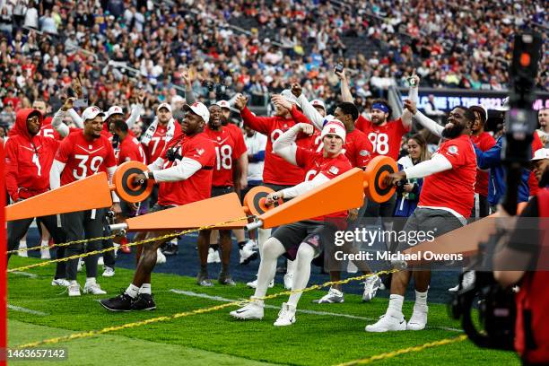 Defensive end Trey Hendrickson of the Cincinnati Bengals, AFC defensive tackle Quinnen Williams of the New York Jets and AFC defensive tackle Jeffery...