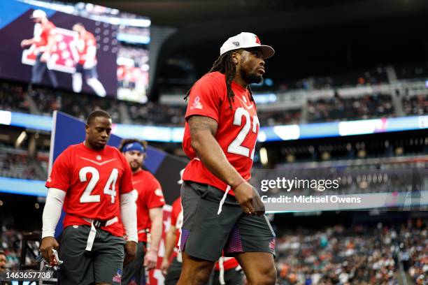 Running back Derrick Henry of the Tennesse Titans and AFC running back Nick Chubb of the Cleveland Browns walk down the ramp during an NFL Pro Bowl...