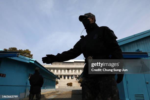 South Korean soldiers stand guard in the truce village of Panmunjom inside the demilitarized zone separating South and North Korea on February 07,...