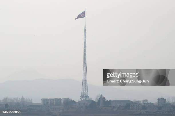 North Korean national flag in North Korea's propaganda village of Gijungdong is seen from a South Korea's observation post inside the demilitarized...