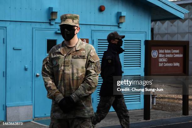 South Korean and United Nations Command soldiers stand guard in the truce village of Panmunjom inside the demilitarized zone separating South and...