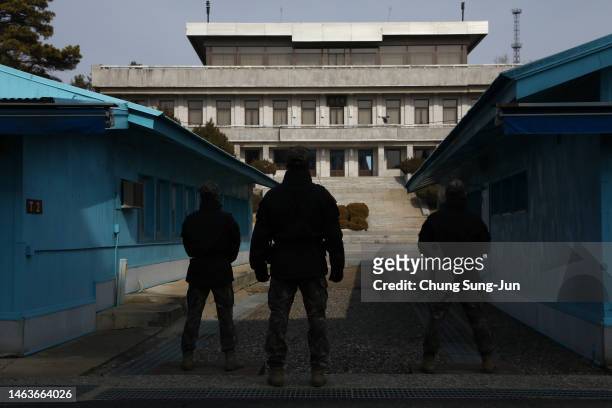 South Korean soldiers stand guard in the truce village of Panmunjom inside the demilitarized zone separating South and North Korea on February 07,...