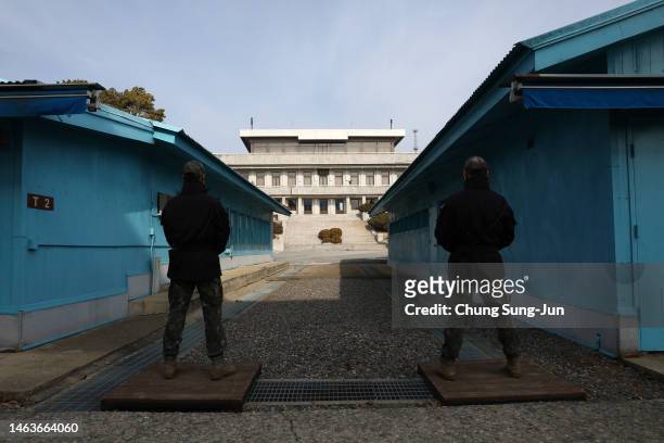 South Korean soldiers stand guard in the truce village of Panmunjom inside the demilitarized zone separating South and North Korea on February 07,...
