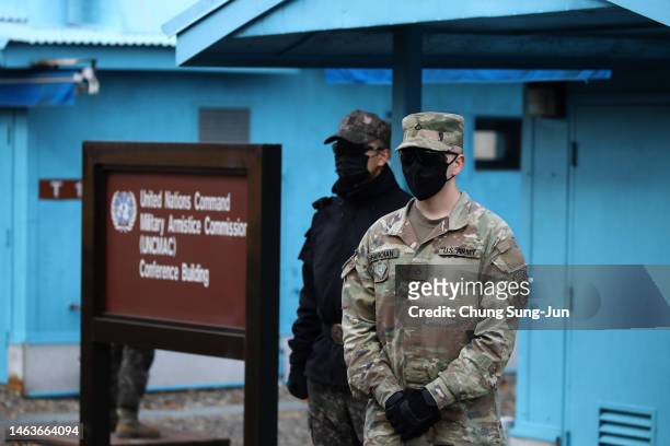 South Korean and United Nations Command soldiers stand guard in the truce village of Panmunjom inside the demilitarized zone separating South and...