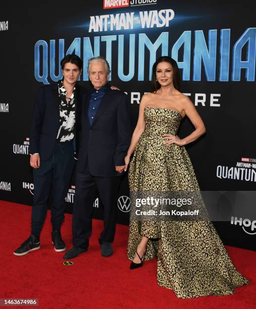 Dylan Michael Douglas, Michael Douglas, and Catherine Zeta-Jones attend Marvel Studios' “Ant-Man And The Wasp: Quantumania" at Regency Village...