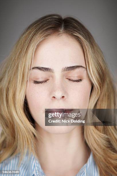 global head shots 25 - woman with eyes closed stock pictures, royalty-free photos & images