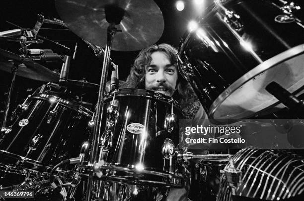 Drummer Neil Peart from Canadian band Rush performs live on stage at the Aragon Ballroom in Chicago, Illinois during their All The World's a Stage...