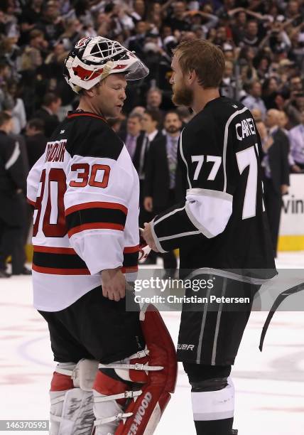 Goaltender Martin Brodeur of the New Jersey Devils and Jeff Carter of the Los Angeles Kings shake hands following Game Six of the 2012 Stanley Cup...