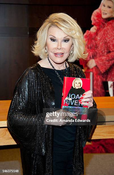 Comedian Joan Rivers poses before signing copies of her new book "I Hate Everyone...Starting With Me" at Barnes & Noble bookstore at The Grove on...