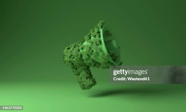 3d illustration of megaphone covered with plants against green background - environmental issues stock illustrations
