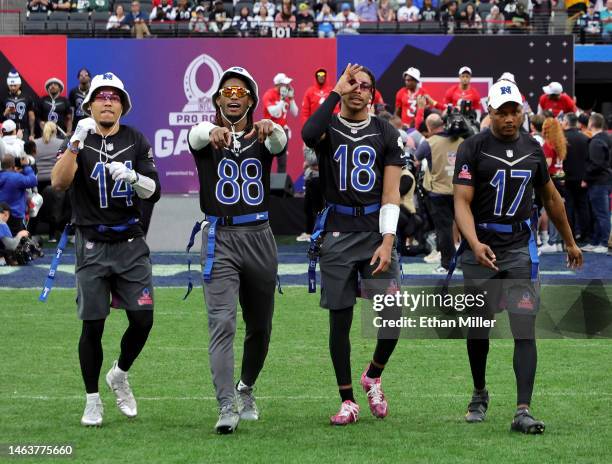 Players Amon-Ra St. Brown of the Detroit Lions, CeeDee Lamb of the Dallas Cowboys, Justin Jefferson of the Minnesota Vikings and Terry McLaurin of...