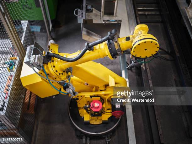 robotic arm in modern factory - mechatronics fotografías e imágenes de stock