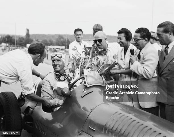 Italian racing driver Giuseppe Farina wins the Lausanne Grand Prix in Switzerland, 27th August 1949.