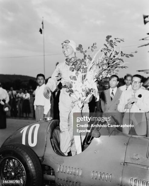 Italian racing driver Giuseppe Farina wins the Lausanne Grand Prix in Switzerland, 27th August 1949.